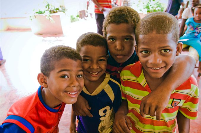 Four boys smiling - Dental Mission in the Dominican Republic